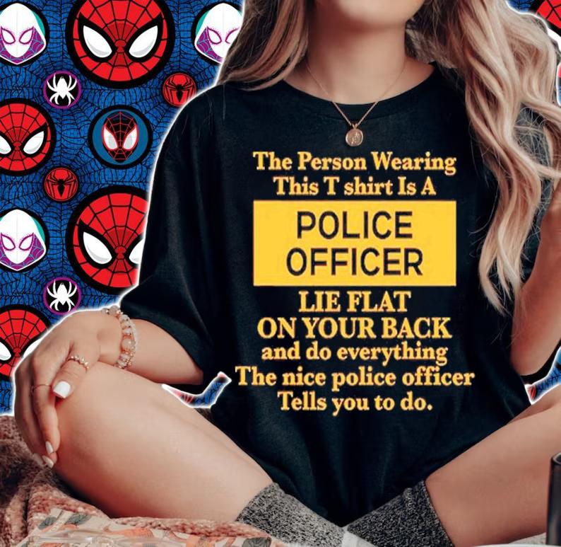 The Person Wearing This T Shirt Is A Police Officer Lie Flat On Your Back Shirt t-shirt